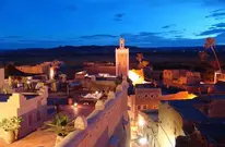The historic mud-brick Kasbahs and cinematic landscapes of Ouarzazate, easily reached by direct private transfer from Marrakech.